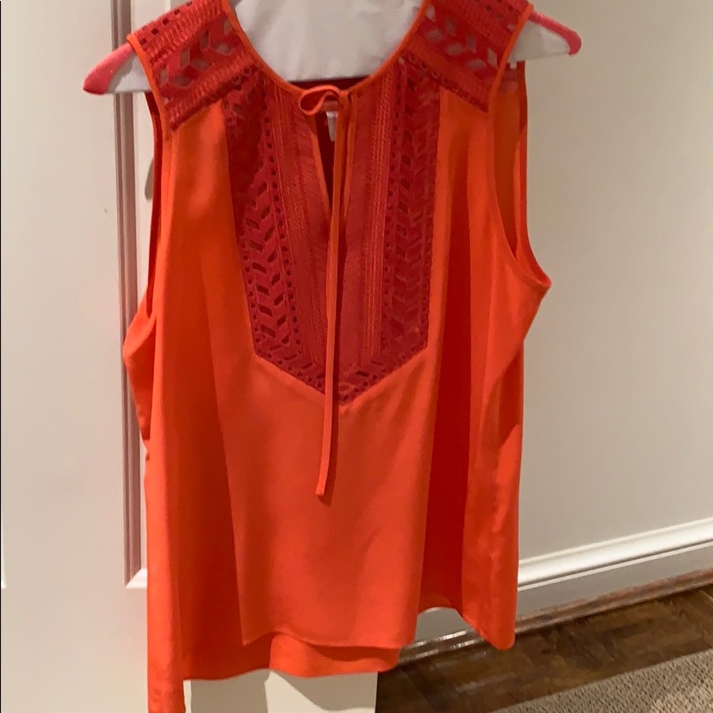 Bright orange blouse